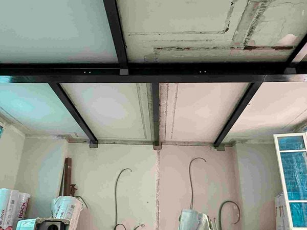 Reprise du solivage métallique avec portique à Paris